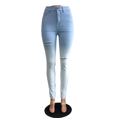 Blue and white gradient ripped jeans